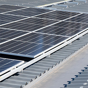 Solar panel mounting detail on commercial roof Auckland