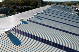 Viking Factory Reroof with long run metal roofing and cladding